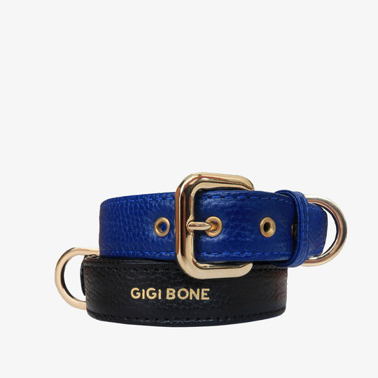 Collar de perro en piel color azul con hebilla dorada y ojales metalizados dorados. Marca GiGi BONE impresa en el cuero en letras doradas a juego con los herrajes. Piel italiana de curtido vegetal y herrajes de gran calidad. Hecho a mano, con bordes de piel doblada y cosida, sin recubrimientos plásticos, que le da una estética premium y gran durabilidad